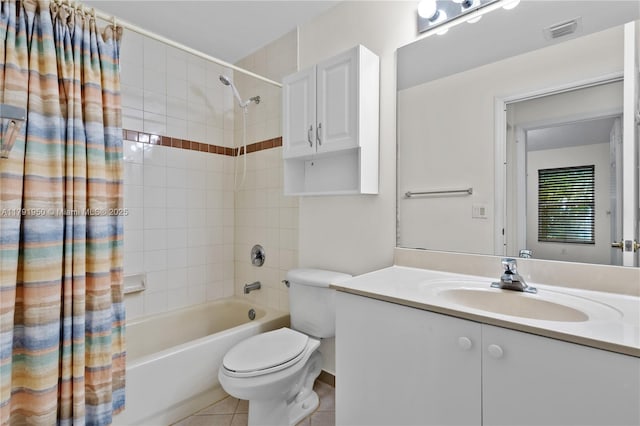 full bathroom with visible vents, shower / bath combo with shower curtain, vanity, toilet, and tile patterned floors