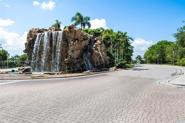 view of road with curbs