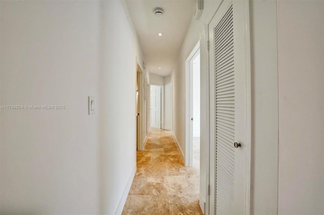 255 Ridgewood Rd, Key Biscayne, FL 33149 - corridor with baseboards and recessed lighting