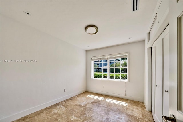 255 Ridgewood Rd, Key Biscayne, FL 33149 - unfurnished bedroom featuring baseboards
