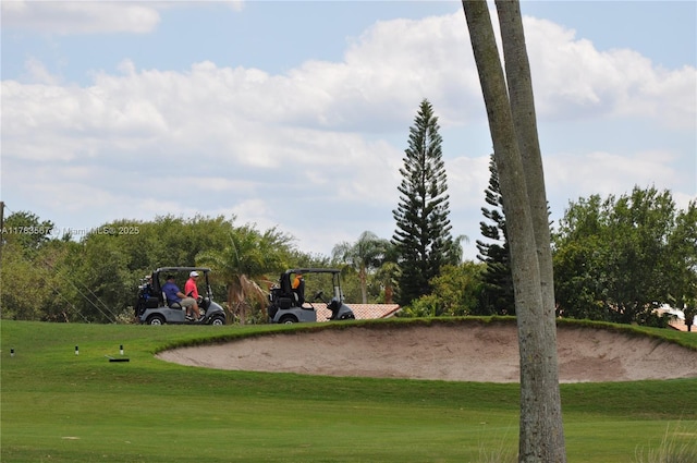 surrounding community with a lawn