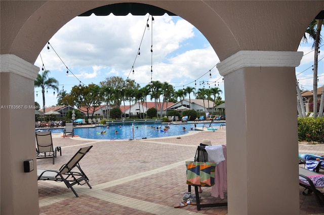 pool with a patio