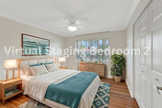 7141 Haviland Cir, Boynton Beach, FL 33437 - bedroom with baseboards, ornamental molding, a closet, and wood finished floors