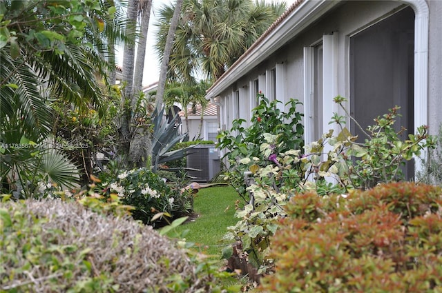 7141 Haviland Cir, Boynton Beach, FL 33437 - view of side of home with central AC unit