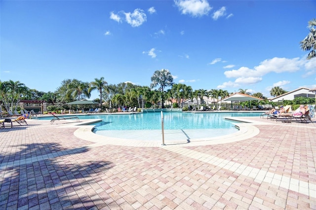 7141 Haviland Cir, Boynton Beach, FL 33437 - community pool with a patio area