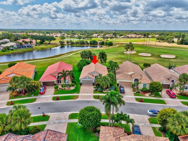 7141 Haviland Cir, Boynton Beach, FL 33437 - bird's eye view featuring a residential view, view of golf course, and a water view