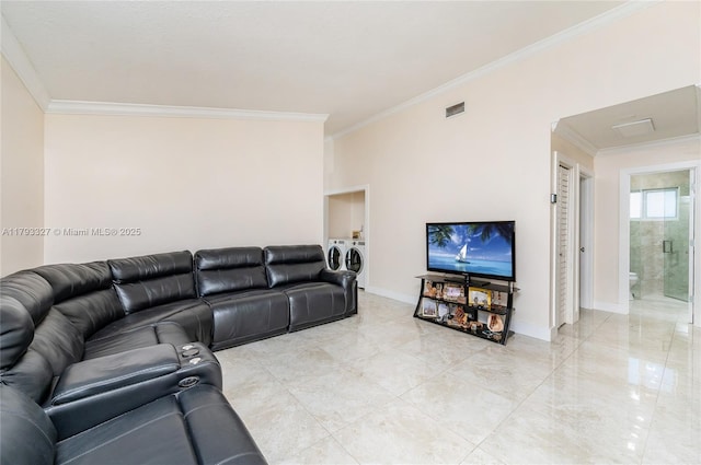 6829 W 26th Ave, Hialeah, FL 33016 - living room featuring visible vents, washing machine and dryer, baseboards, marble finish floor, and ornamental molding