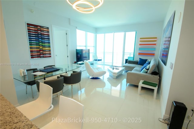 950 Brickell Bay Dr Unit 4710, Miami, FL 33131 - living area with tile patterned flooring and a notable chandelier