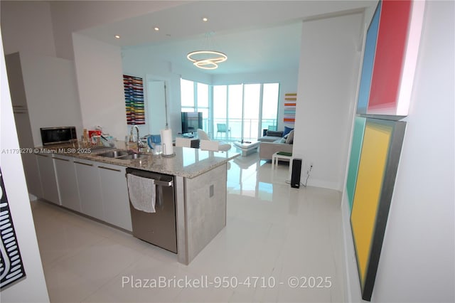 950 Brickell Bay Dr Unit 4710, Miami, FL 33131 - kitchen with recessed lighting, a sink, light tile patterned flooring, and stainless steel appliances