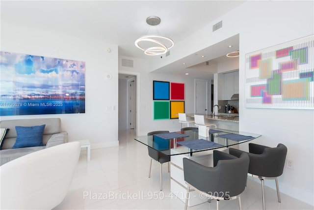 950 Brickell Bay Dr Unit 4710, Miami, FL 33131 - dining area featuring baseboards