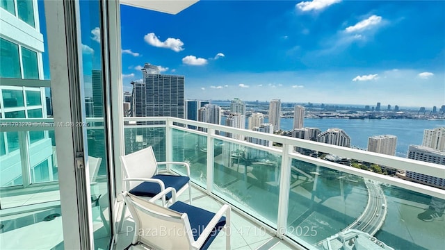 950 Brickell Bay Dr Unit 4710, Miami, FL 33131 - balcony featuring a view of city and a water view