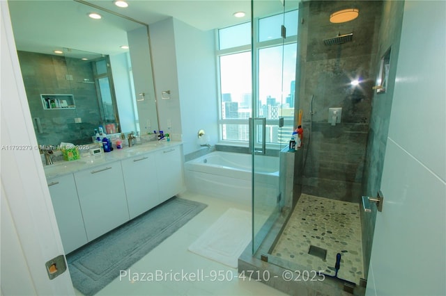 950 Brickell Bay Dr Unit 4710, Miami, FL 33131 - full bathroom with a garden tub, recessed lighting, a sink, and a shower stall
