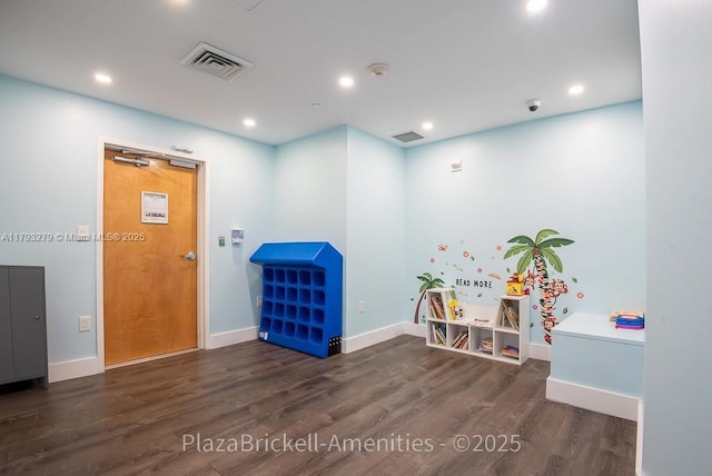 950 Brickell Bay Dr Unit 4710, Miami, FL 33131 - miscellaneous room featuring wood finished floors, recessed lighting, and baseboards