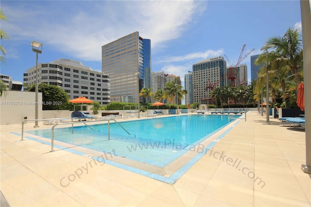 950 Brickell Bay Dr Unit 4710, Miami, FL 33131 - pool featuring a view of city and a patio area