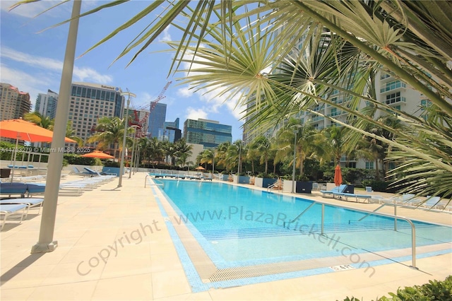 950 Brickell Bay Dr Unit 4710, Miami, FL 33131 - pool with a city view and a patio area