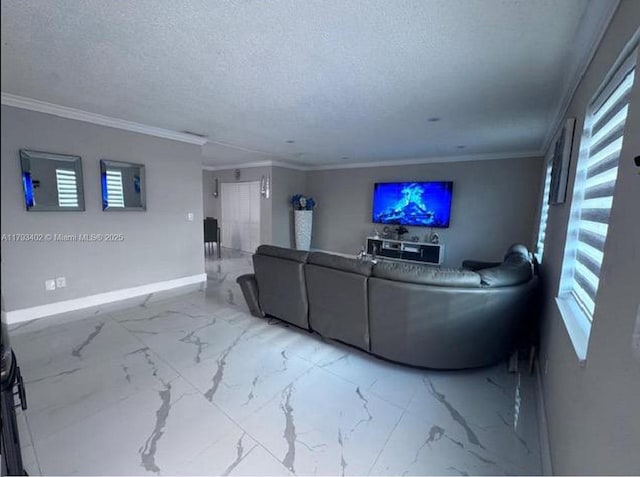 living area with baseboards, a textured ceiling, marble finish floor, and ornamental molding