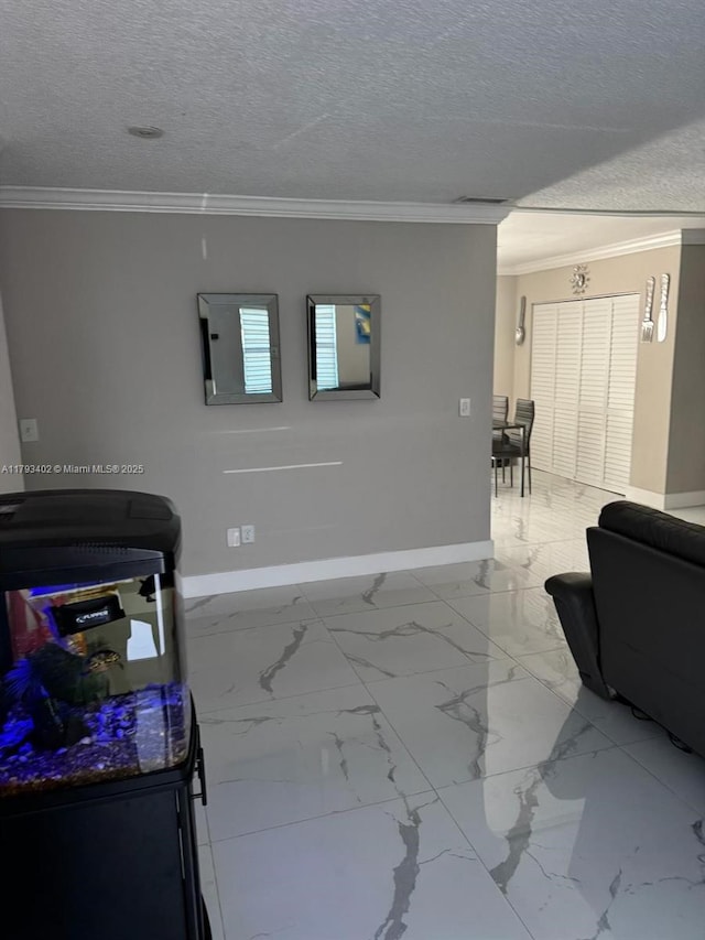 living room featuring crown molding, baseboards, a textured ceiling, and marble finish floor
