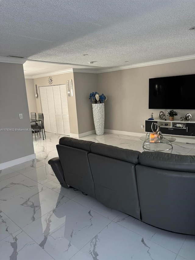 living area featuring crown molding, baseboards, and marble finish floor