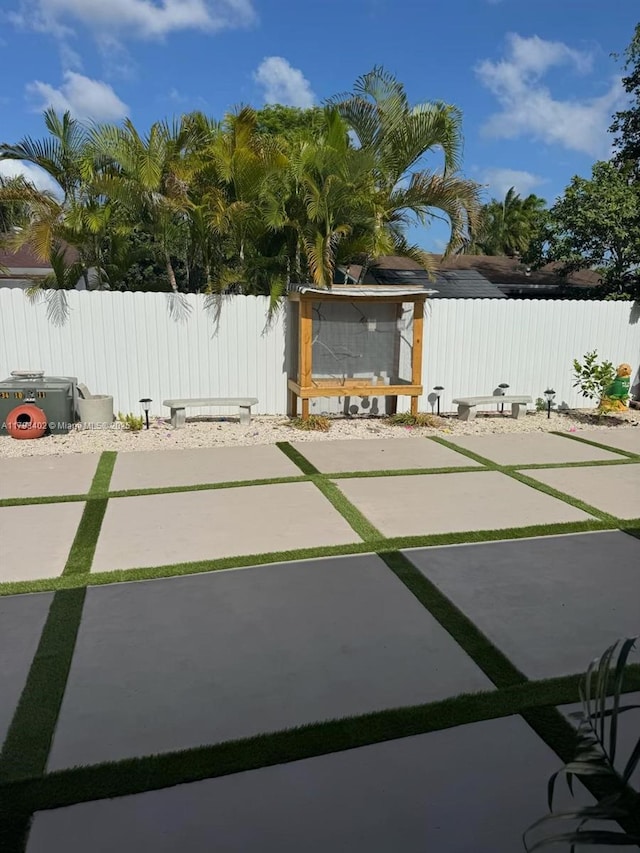 view of yard featuring a fenced backyard and a patio area