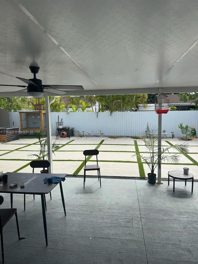 view of property's community featuring a patio and a fenced backyard