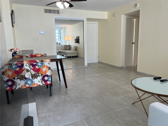 2655 Collins Ave Unit 1405, Miami Beach, FL 33140 - interior space with visible vents, a ceiling fan, and a textured ceiling