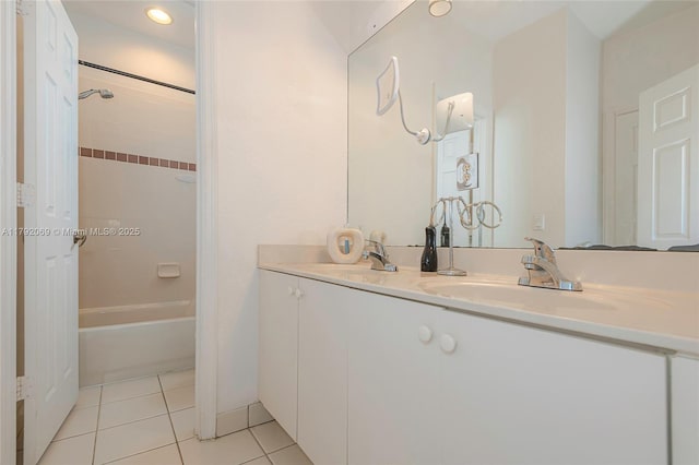 bathroom with shower / bath combo with shower curtain, a sink, tile patterned floors, and double vanity