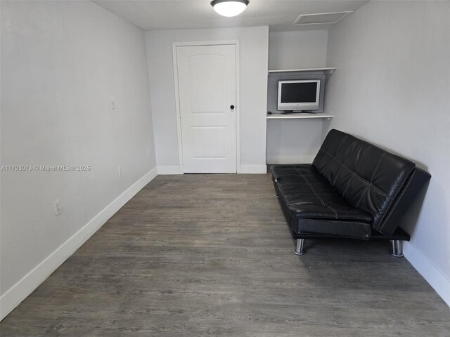 3801 NW 8th Ct, Lauderhill, FL 33311 - living area with baseboards and wood finished floors
