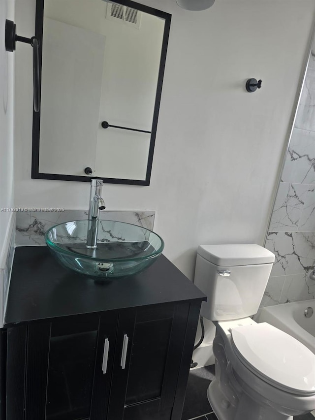3801 NW 8th Ct, Lauderhill, FL 33311 - bathroom with vanity, toilet, and visible vents