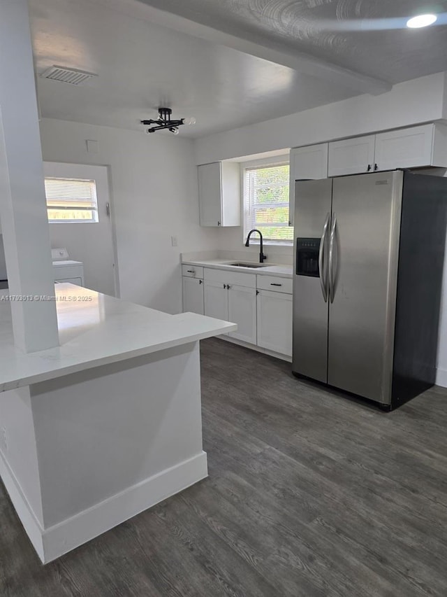 3801 NW 8th Ct, Lauderhill, FL 33311 - kitchen with stainless steel fridge, a sink, dark wood finished floors, and baseboards