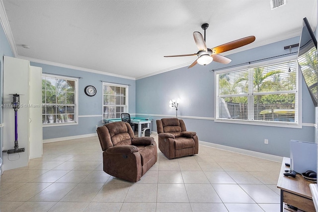 2131 NE 40th Rd, Homestead, FL 33033 - living room with crown molding, plenty of natural light, light tile patterned flooring, a ceiling fan, and baseboards