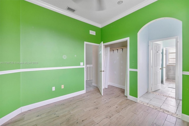 2131 NE 40th Rd, Homestead, FL 33033 - unfurnished bedroom featuring wood finished floors, ornamental molding, baseboards, and a closet