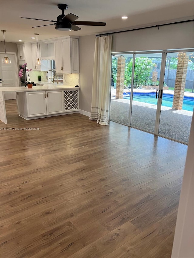 14520 SW 79th Ct, Palmetto Bay, FL 33158 - unfurnished living room featuring ceiling fan, recessed lighting, and dark wood-style flooring