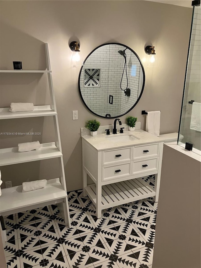 14520 SW 79th Ct, Palmetto Bay, FL 33158 - bathroom featuring tile patterned floors, vanity, and a tile shower