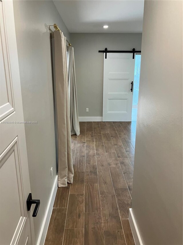 14520 SW 79th Ct, Palmetto Bay, FL 33158 - hall featuring dark wood-type flooring and a barn door