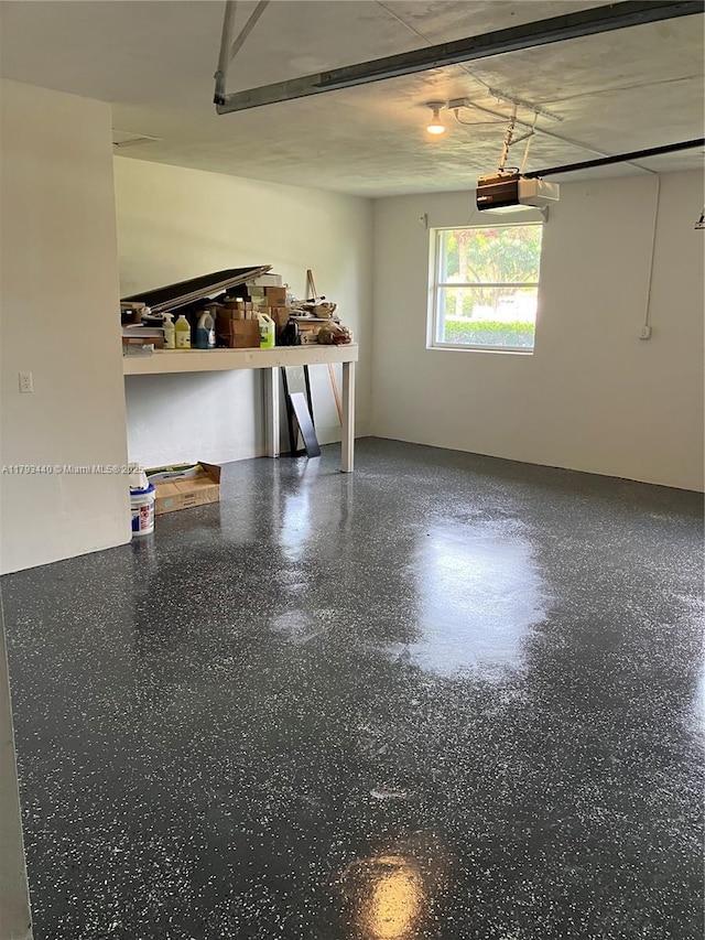 14520 SW 79th Ct, Palmetto Bay, FL 33158 - garage featuring a garage door opener