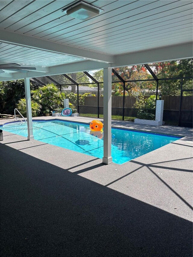 14520 SW 79th Ct, Palmetto Bay, FL 33158 - view of pool with a fenced backyard, a patio, and a lanai