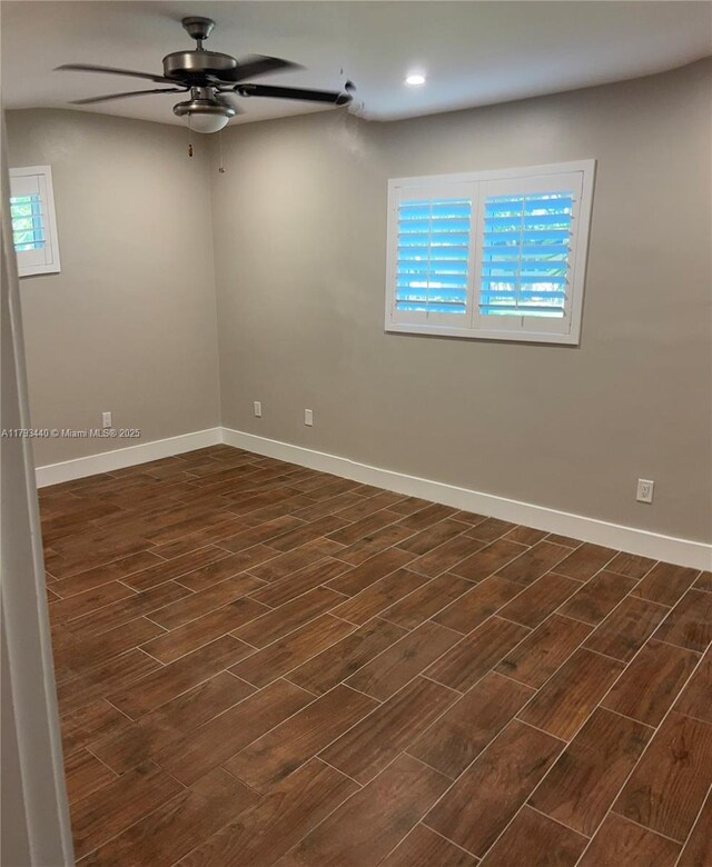 14520 SW 79th Ct, Palmetto Bay, FL 33158 - empty room featuring dark wood-style floors, ceiling fan, plenty of natural light, and recessed lighting