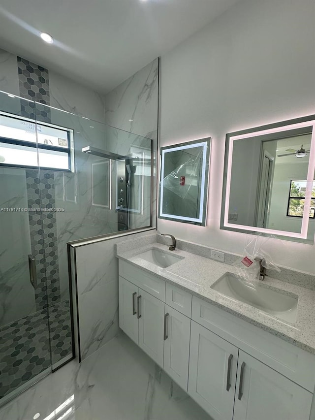 1022 Candleligth St, Lehigh Acres, FL 33974 - full bath featuring a marble finish shower, plenty of natural light, and a sink