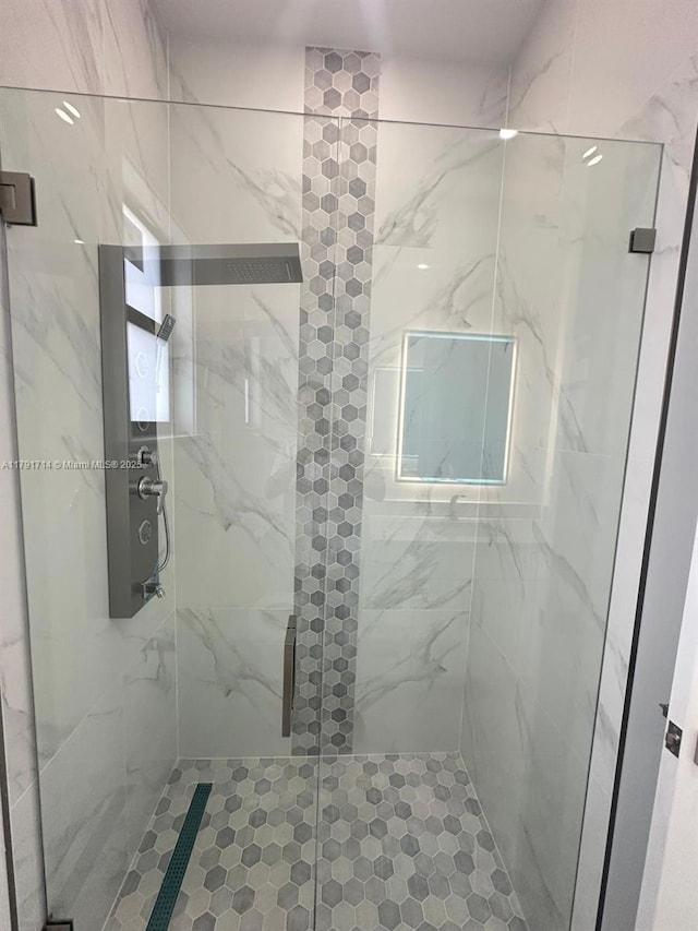 1022 Candleligth St, Lehigh Acres, FL 33974 - bathroom with a marble finish shower