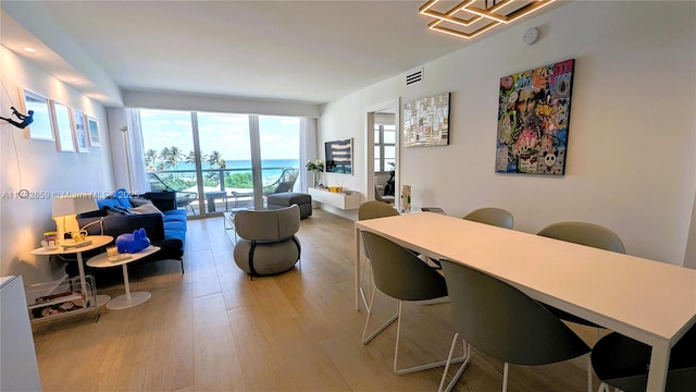 5151 Collins Ave Unit 634, Miami Beach, FL 33140 - office space featuring light wood-style flooring and visible vents