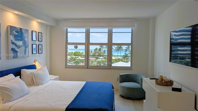 bedroom with wood finished floors
