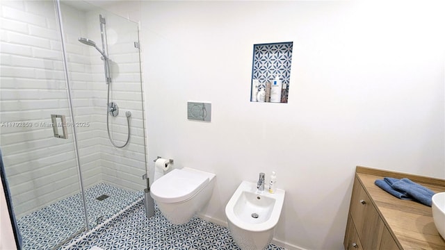 full bath featuring baseboards, a bidet, toilet, and a shower stall