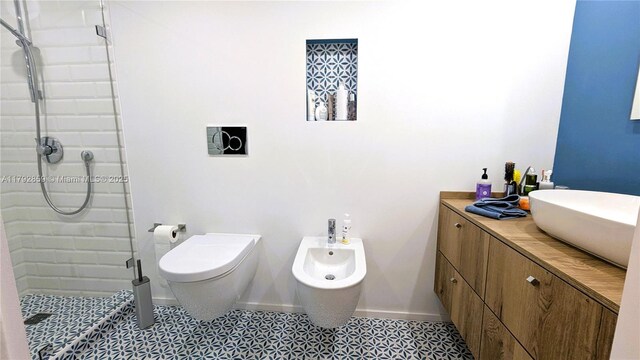5151 Collins Ave Unit 634, Miami Beach, FL 33140 - bathroom featuring a bidet, toilet, baseboards, and a stall shower