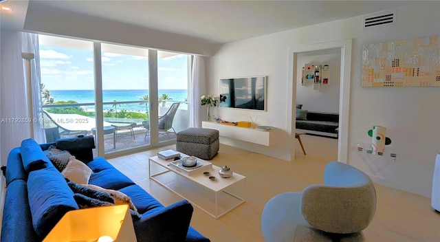 living room featuring visible vents
