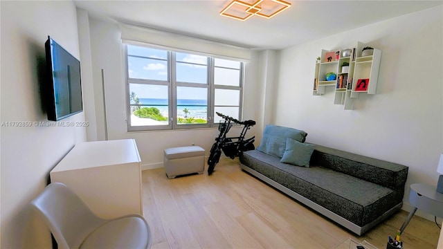 5151 Collins Ave Unit 634, Miami Beach, FL 33140 - living area with wood finished floors and baseboards