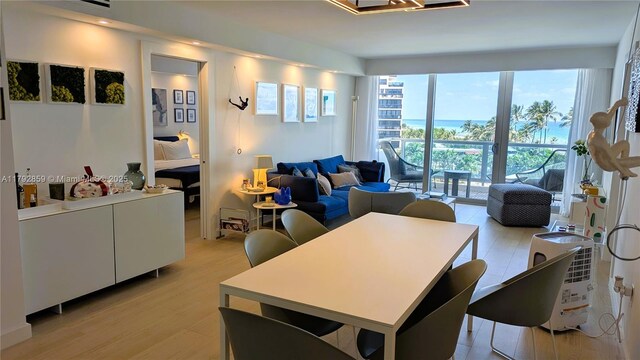 5151 Collins Ave Unit 634, Miami Beach, FL 33140 - living area with light wood finished floors