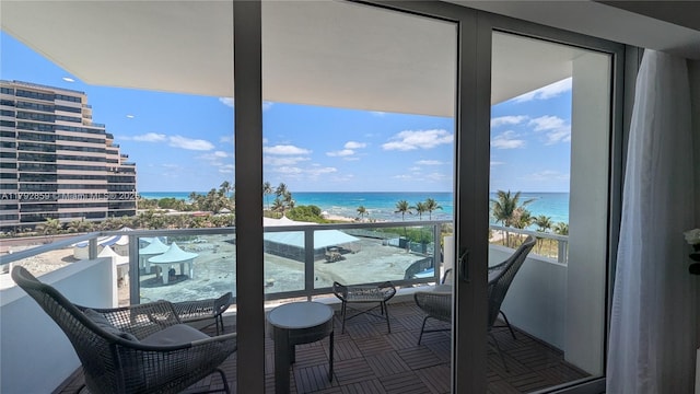 balcony featuring a water view