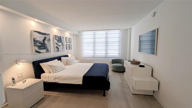 5151 Collins Ave Unit 634, Miami Beach, FL 33140 - bedroom with light wood-type flooring