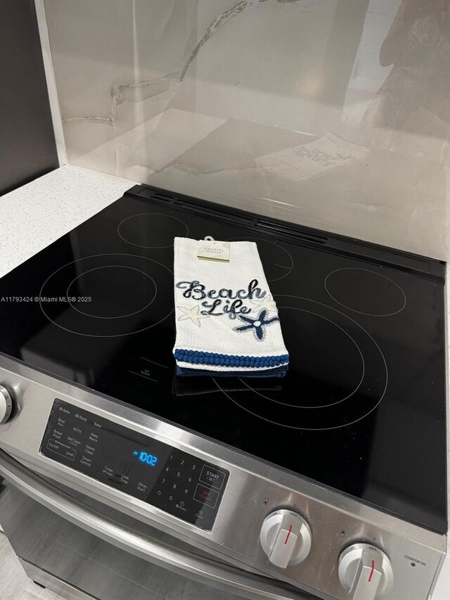 856 NW 47th St Unit 856, Deerfield Beach, FL 33064 - kitchen view of stainless steel electric range oven
