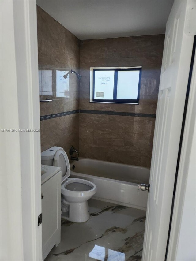 bathroom with shower / tub combination, marble finish floor, toilet, and vanity